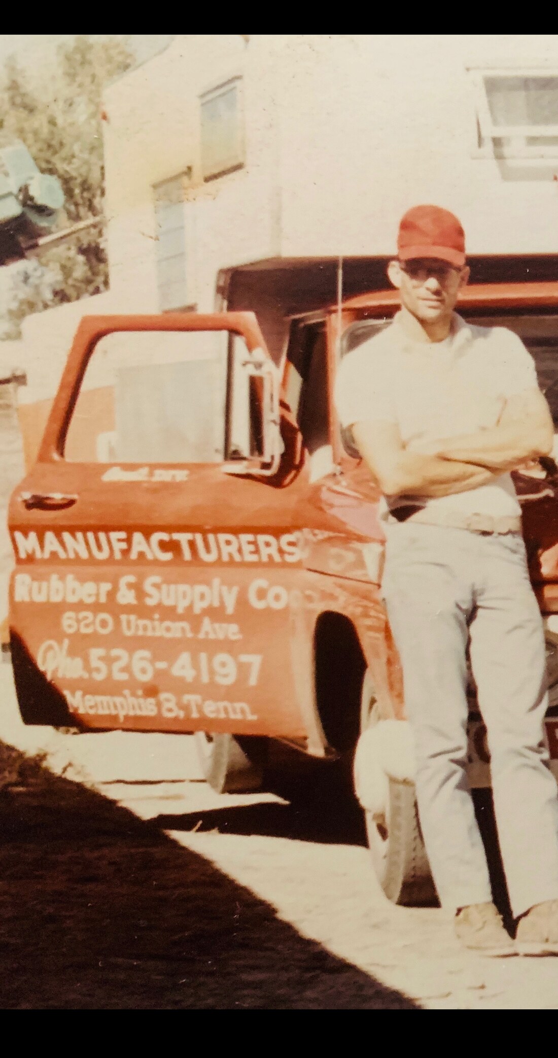 Boyd Arthur Jr. beside the Manufacturers Rubber & Supply Co. delivery truck on Union Avenue in Memphis