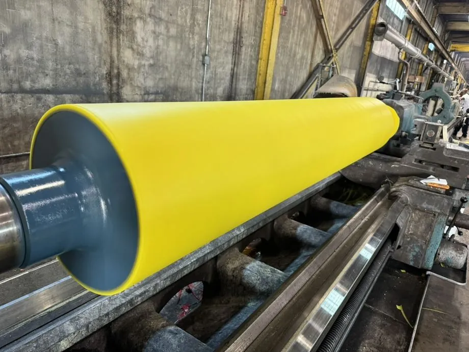 Freshly ground urethane roll cover on the core