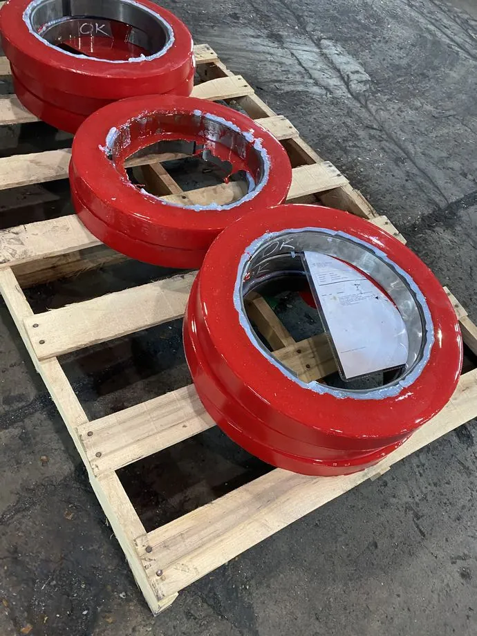 Heavy urethane flanged wheels, bonded to steel