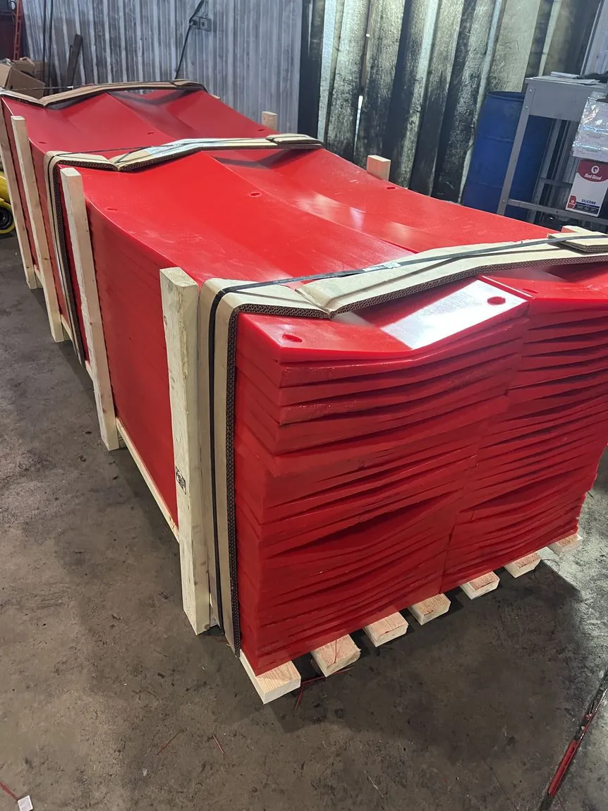 Pallets of red urethane coil floor pads