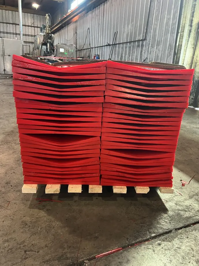 Urethane coil floor pads, poured and crated to ship